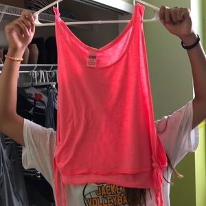 pink tank top, with cut outs in the sides